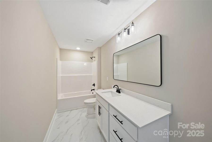 Furnished interior view inside a new home in , Monroe (Image 7).