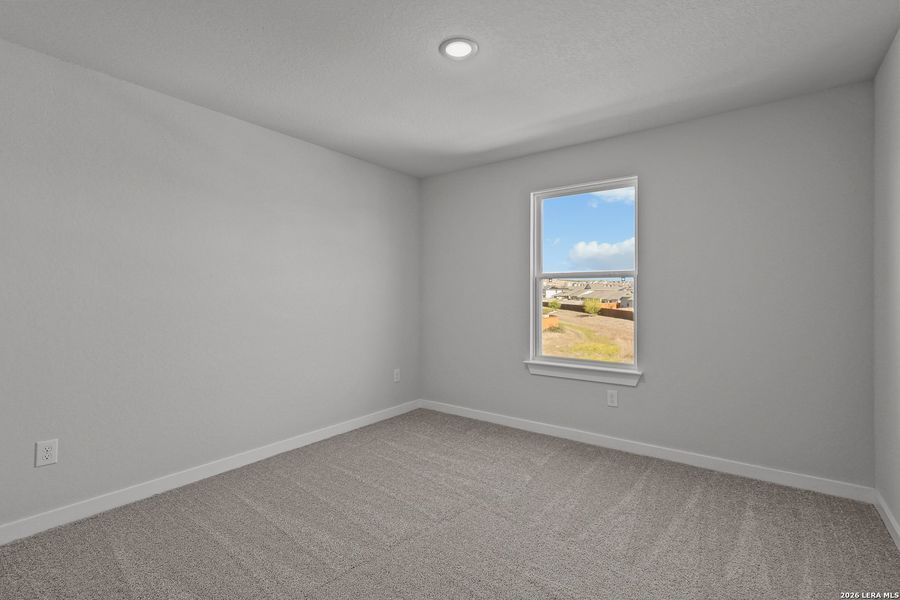 Spacious, unfurnished interior of a new home in Cinco Lakes, San Antonio (Image 32).