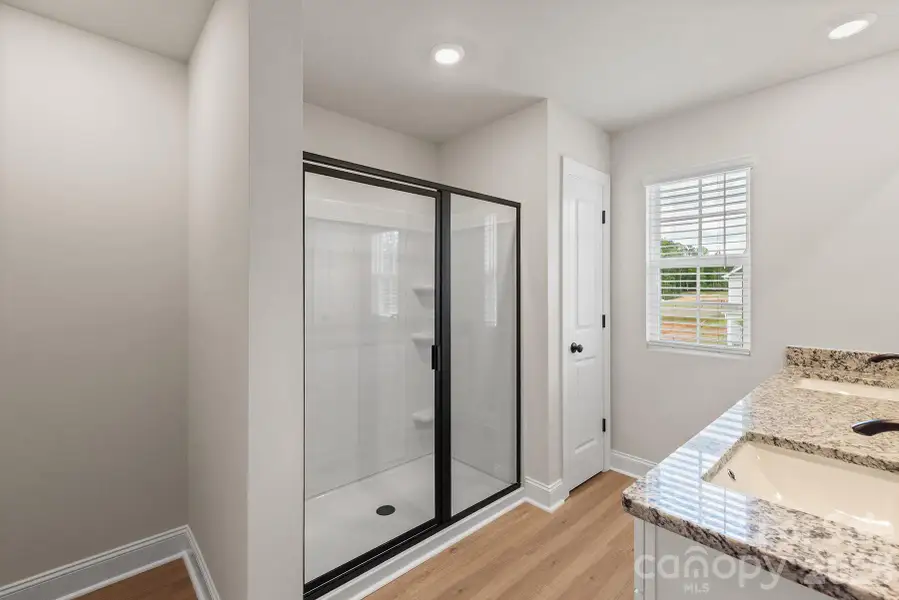 Furnished interior view inside a new home in Ascot Woods, Charlotte (Image 6).