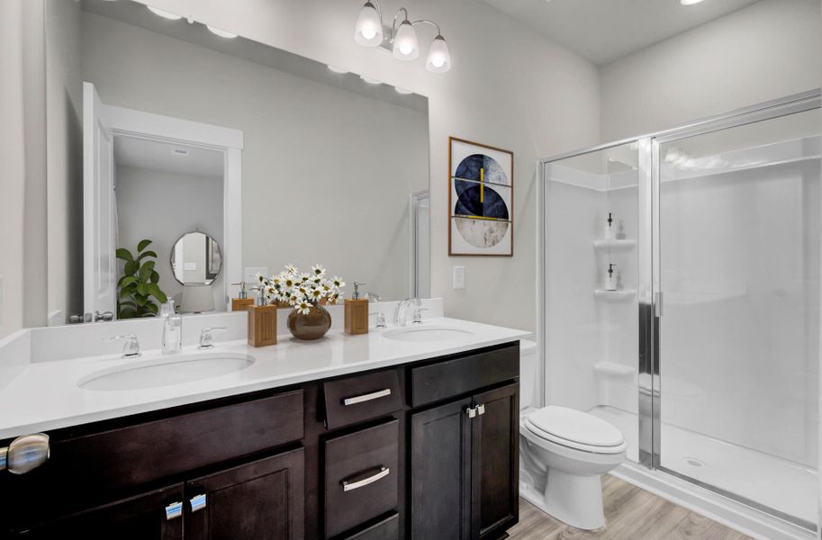 Furnished interior view inside a new home in Westpark at Cane Bay, Summerville (Image 27).