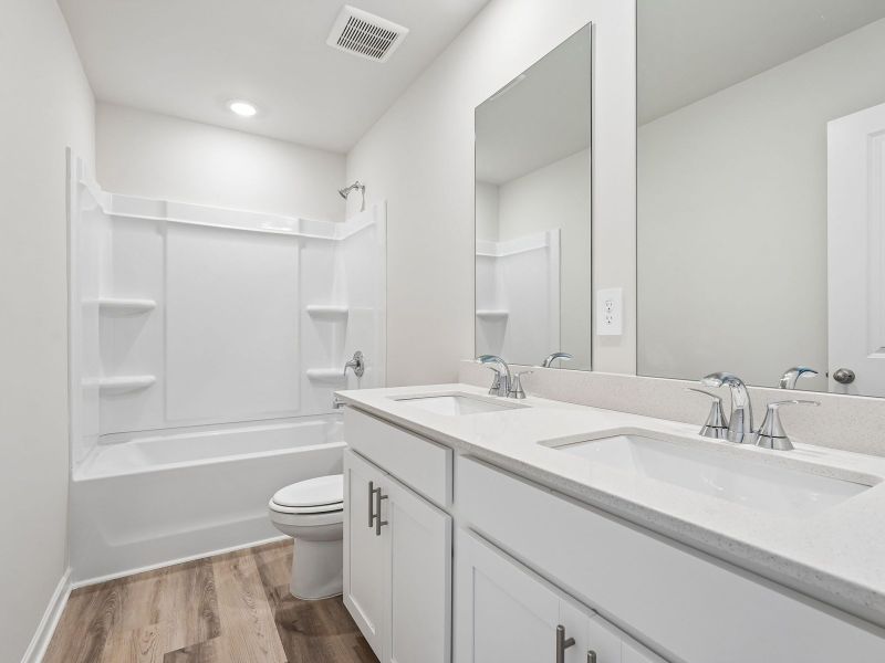 Furnished interior view inside a new home in Northwoods at Mirror Lake, Villa Rica (Image 11).