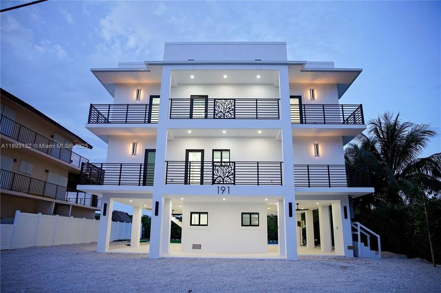 Front exterior of a new home in , Tavernier, FL, highlighting curb appeal (Image 22).