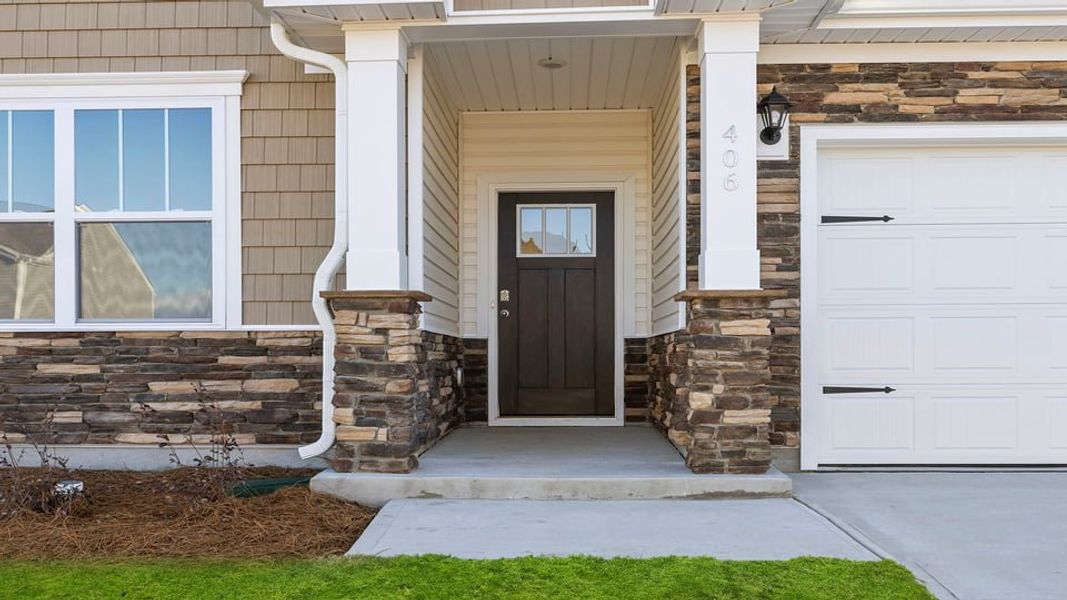 Exterior details and patio area of a home in Bentley Park, Greenwood (Image 2). Exterior details and patio area of a home in Bentley Park, Greenwood (Image 2).