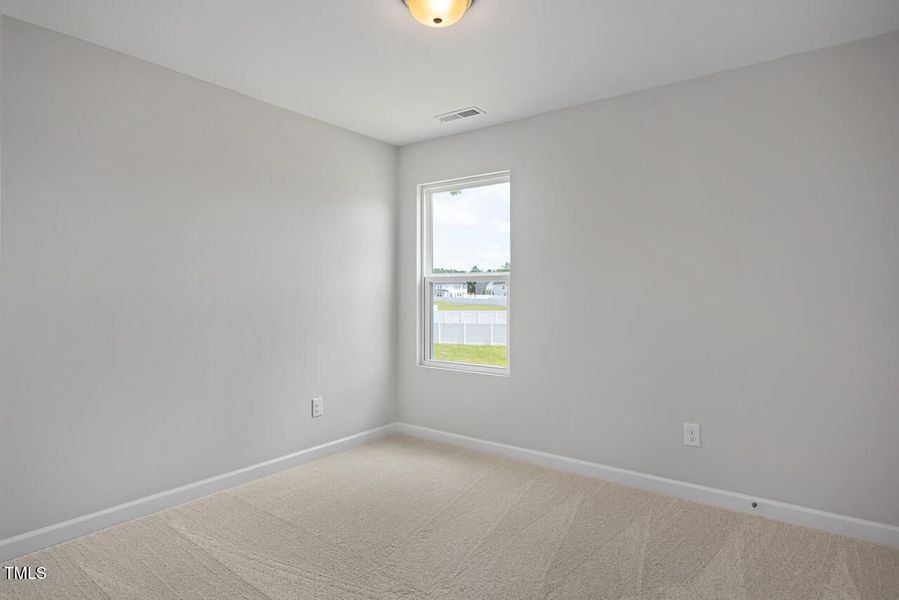 Spacious, unfurnished interior of a new home in Wellers Knoll, Lillington (Image 42).