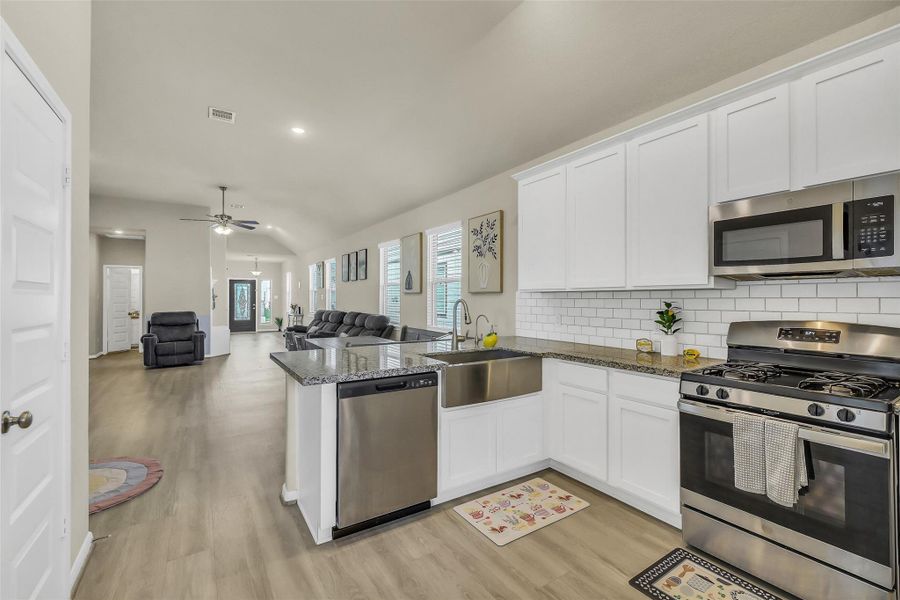 Furnished interior view inside a new home in Willowpoint, Tomball (Image 11).