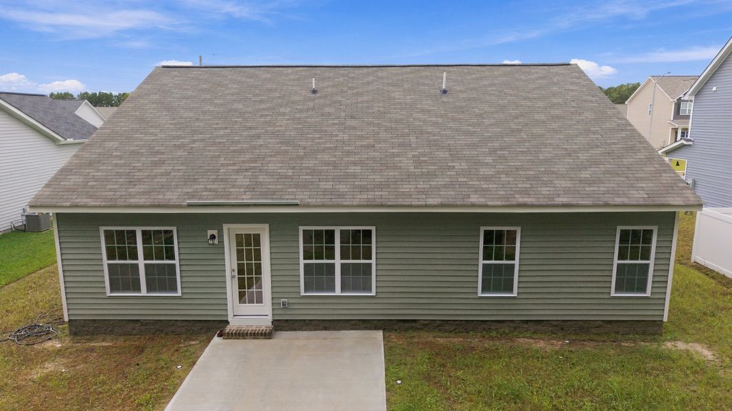 Exterior details and patio area of a home in Davenport Farms, Winterville (Image 24).