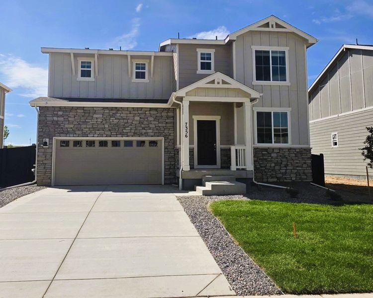 Front exterior of a new home in Westgate, Greeley, CO, highlighting curb appeal (Image 1). Front exterior of a new home in Westgate, Greeley, CO, highlighting curb appeal (Image 1).