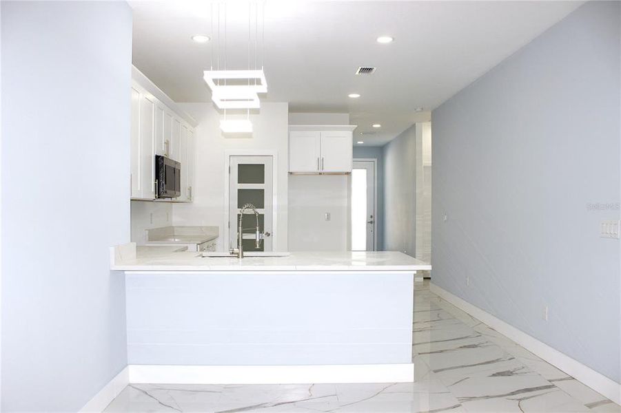 Furnished interior view inside a new home in , Tampa (Image 5).