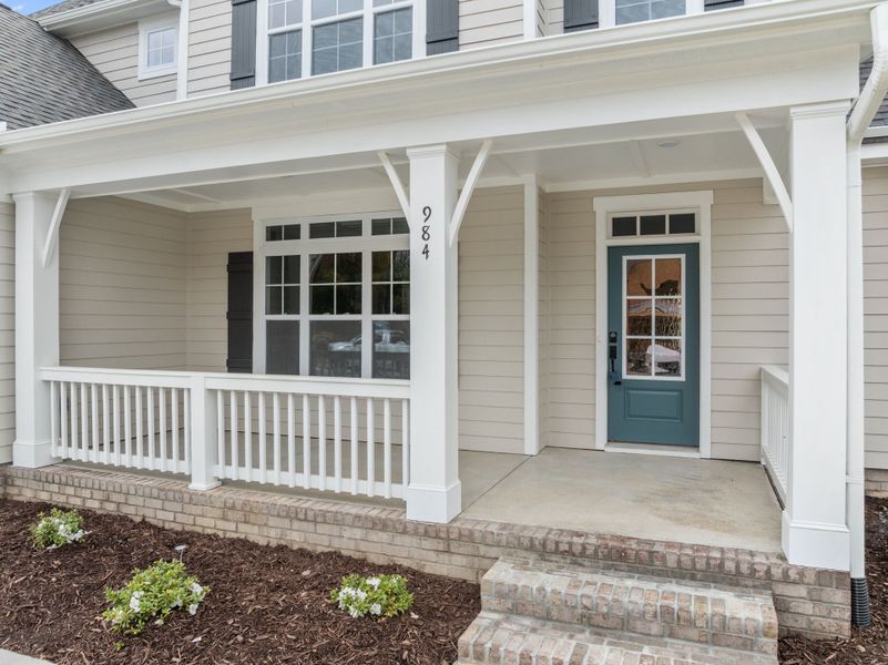 Exterior details and patio area of a home in Eli's Ridge, Winterville (Image 4).