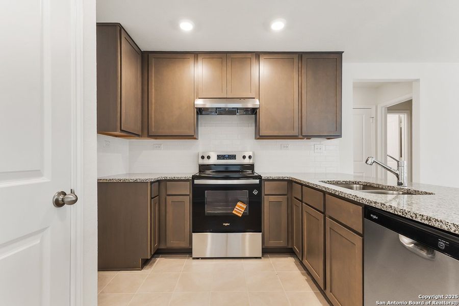 Furnished interior view inside a new home in Southton Cove, Elmendorf (Image 3).