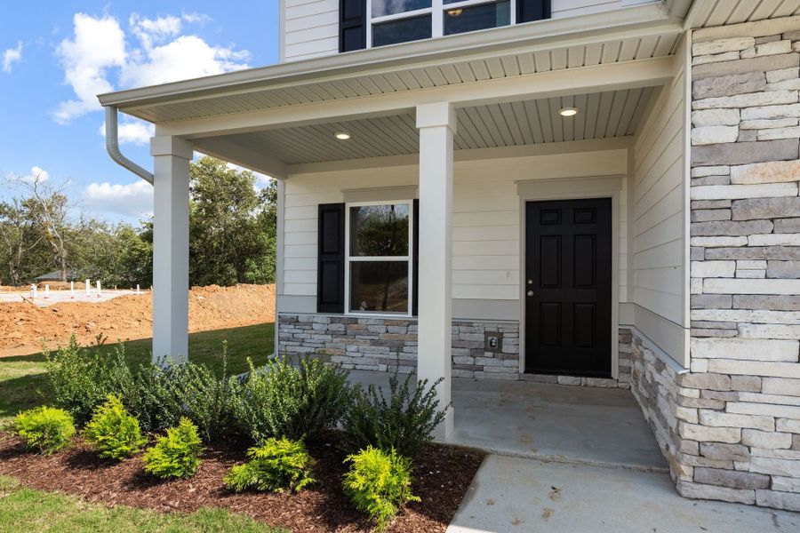 Large front covered patio.