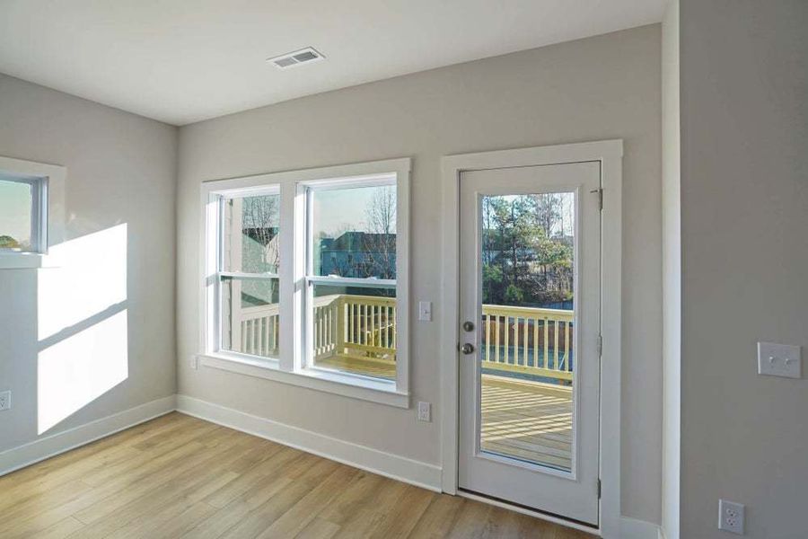 Brier End Unit - Farmhouse Elevation with Front Balcony