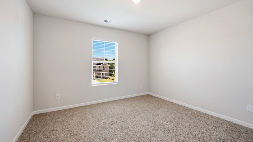 Spacious, unfurnished interior of a new home in Brooks Station, Dacula (Image 26).