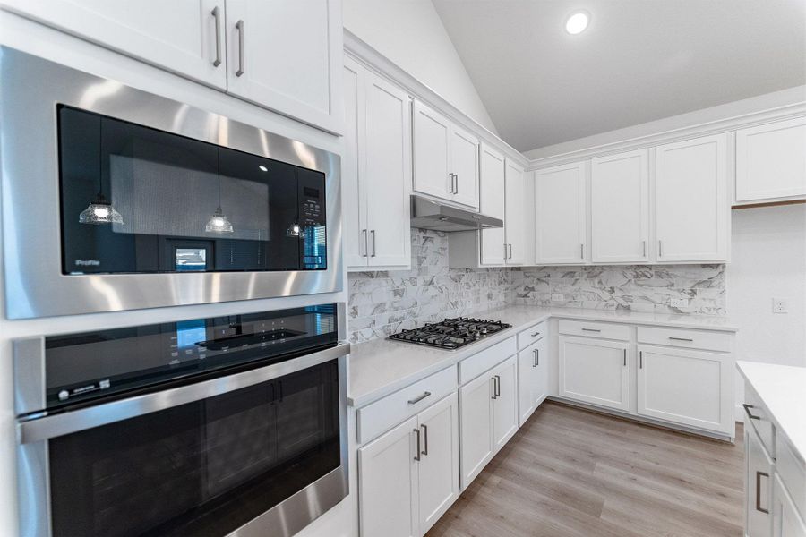 Furnished interior view inside a new home in Sunterra, Katy (Image 4).
