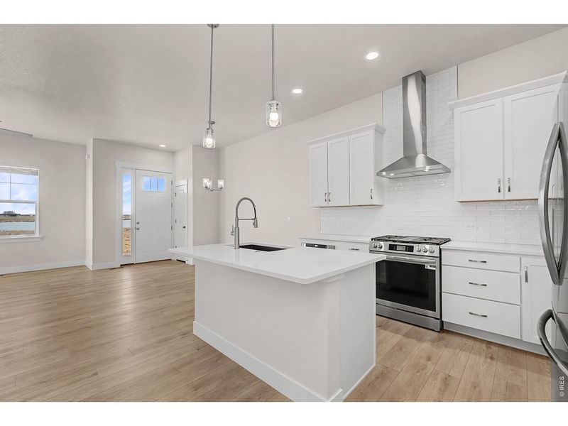 Furnished interior view inside a new home in The Lakes at Centerra - The Shores, Loveland (Image 9).