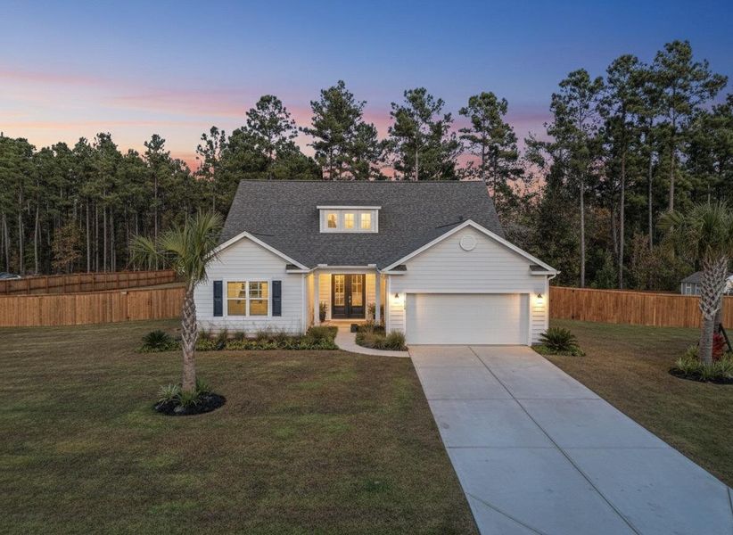 Front exterior of a new home in French Quarter Creek, Huger, SC, highlighting curb appeal (Image 20).