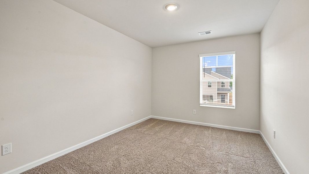 Spacious, unfurnished interior of a new home in Shoal Creek, Hampton (Image 23).