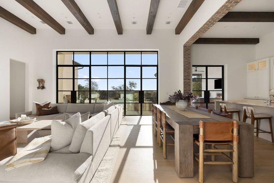 Living room with light wood-style flooring