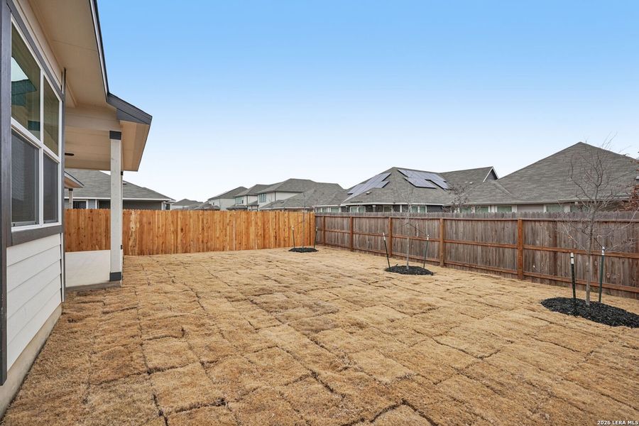 Exterior details and patio area of a home in Estancia Ranch - Premier Series, San Antonio (Image 4).