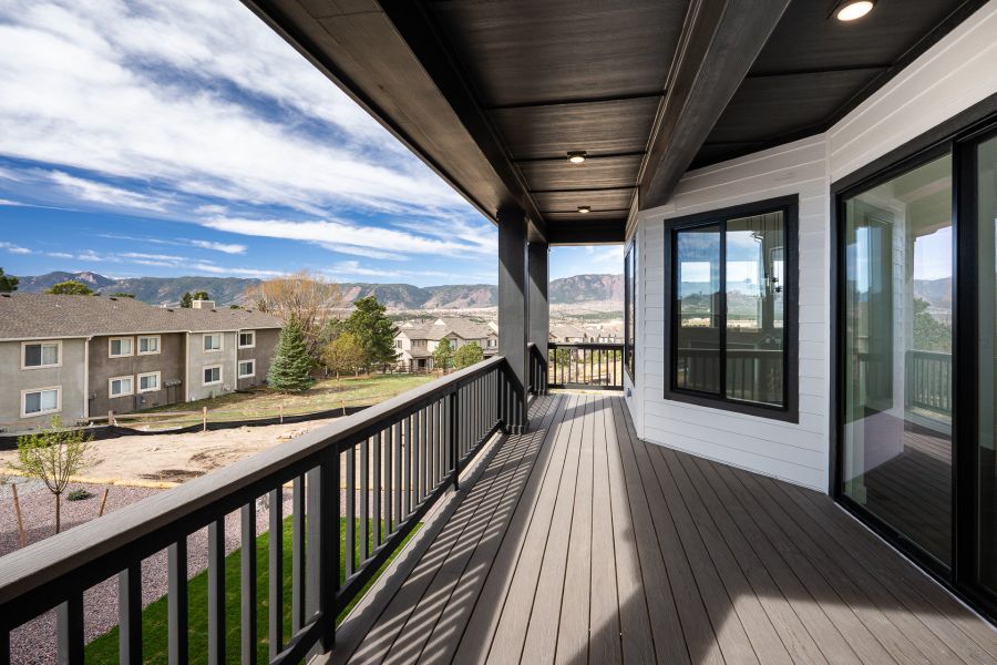 Exterior details and patio area of a home in Cloverleaf - Pinnacle Collection, Monument (Image 3).