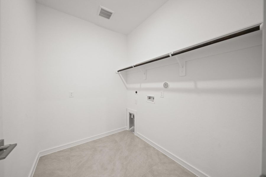 Laundry room (*Photo not of actual home and used for illustration purposes only.)