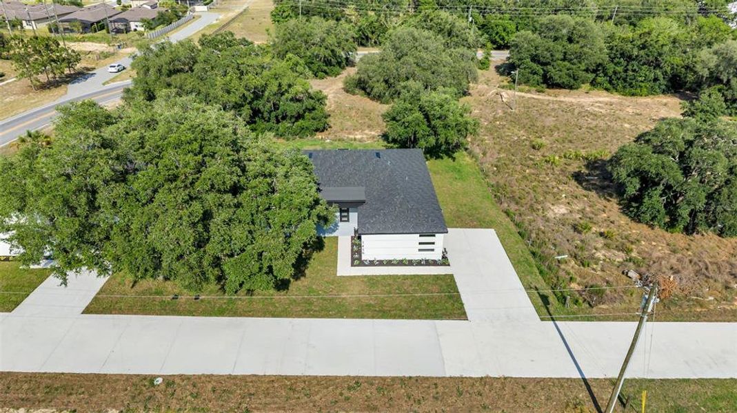 Front exterior of a new home in , Davenport, FL, highlighting curb appeal (Image 20). Front exterior of a new home in , Davenport, FL, highlighting curb appeal (Image 20).