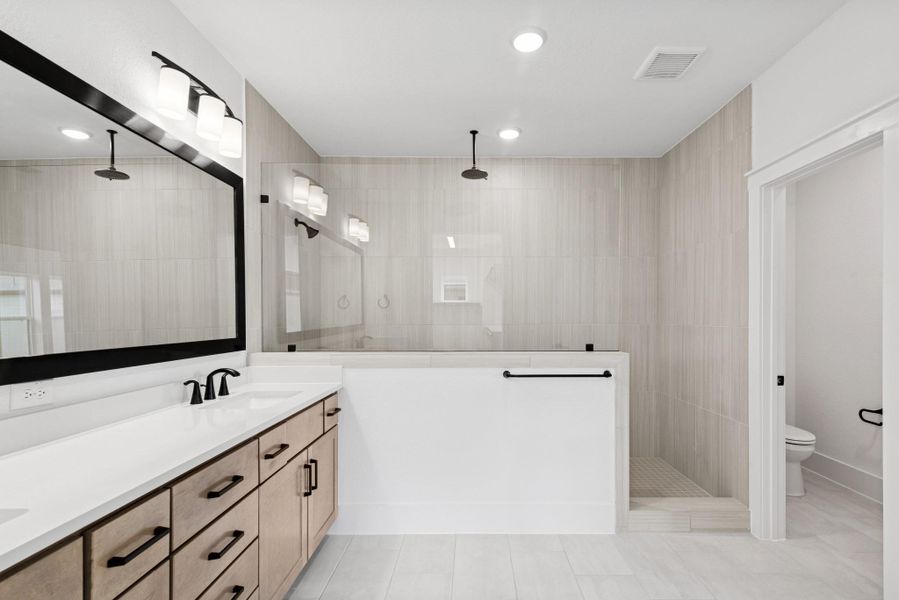 Furnished interior view inside a new home in Easthaven at Bridgeland Central - Vision Collection, Cypress (Image 9).