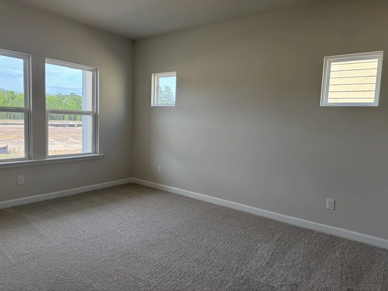 Spacious, unfurnished interior of a new home in Tea Farm, Ravenel (Image 10).