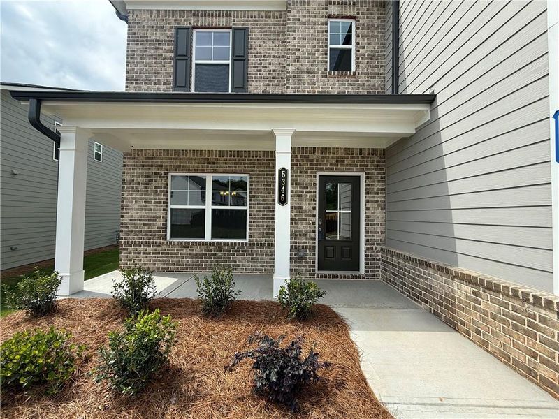 Exterior details and patio area of a home in Ponderosa Farms Estates, Gainesville (Image 21).