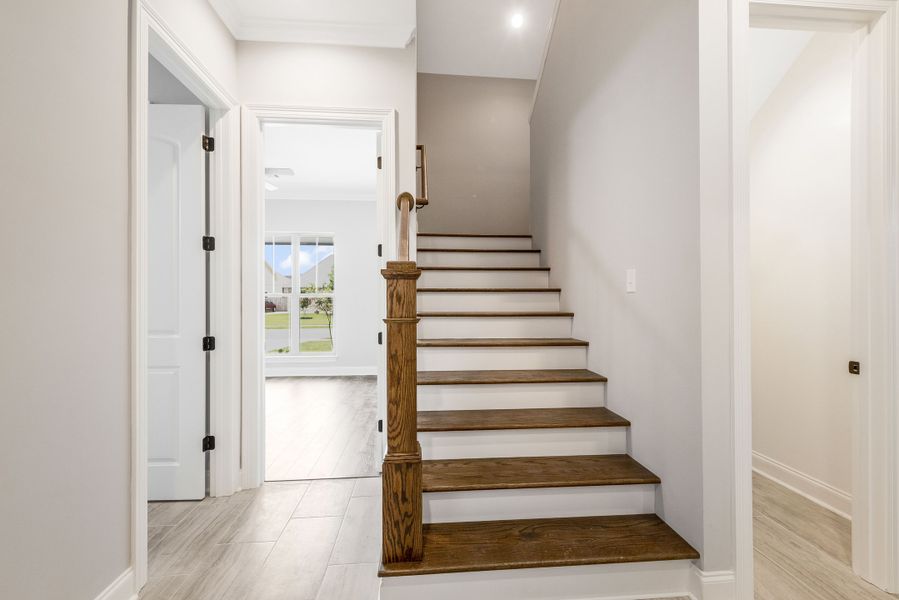 Representative furnished interior of a home built from the The Champagne by Manuel Builders in Chapel Bend, Montgomery (Image 29). Representative furnished interior of a home built from the The Champagne by Manuel Builders in Chapel Bend, Montgomery (Image 29).