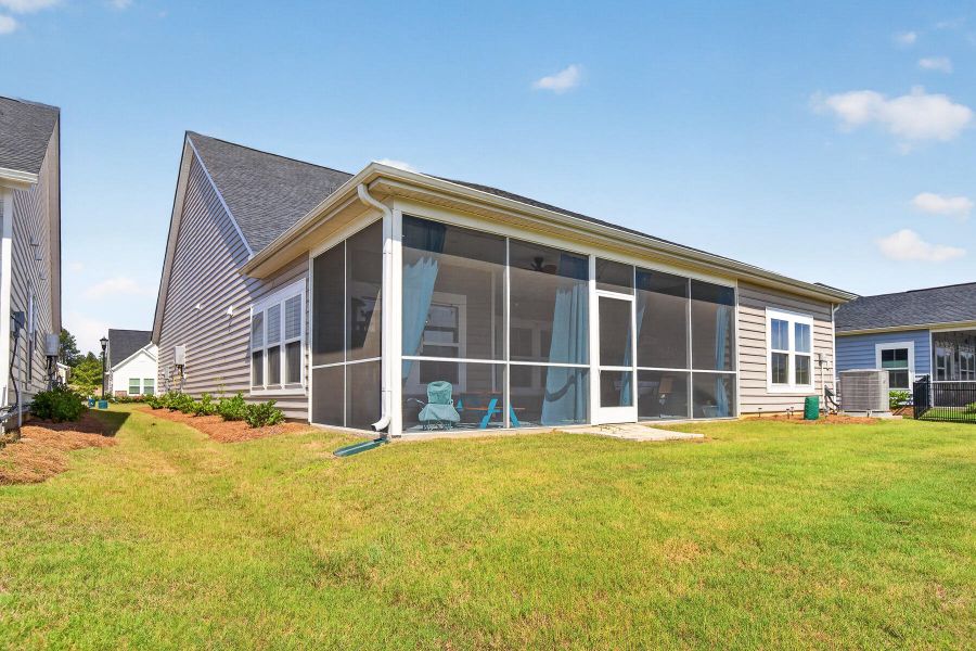 Exterior details and patio area of a home in Horizons at Summers Corner | 55+, Summerville (Image 4).