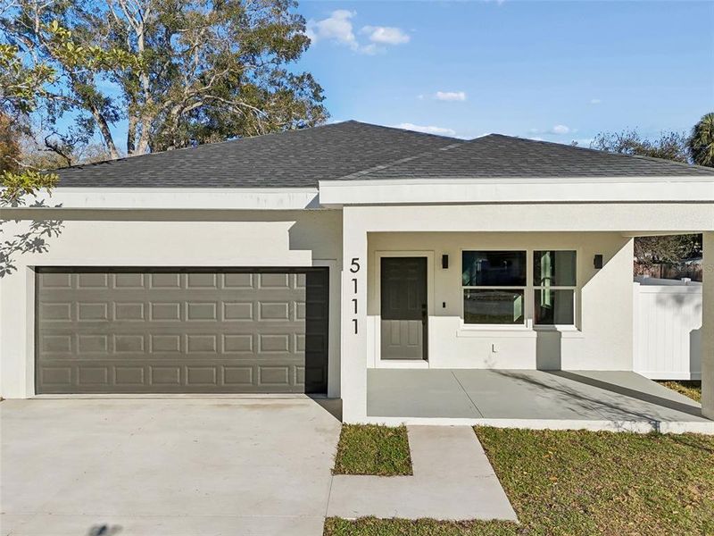 Front exterior of a new home in , St. Petersburg, FL, highlighting curb appeal (Image 26). Front exterior of a new home in , St. Petersburg, FL, highlighting curb appeal (Image 26).