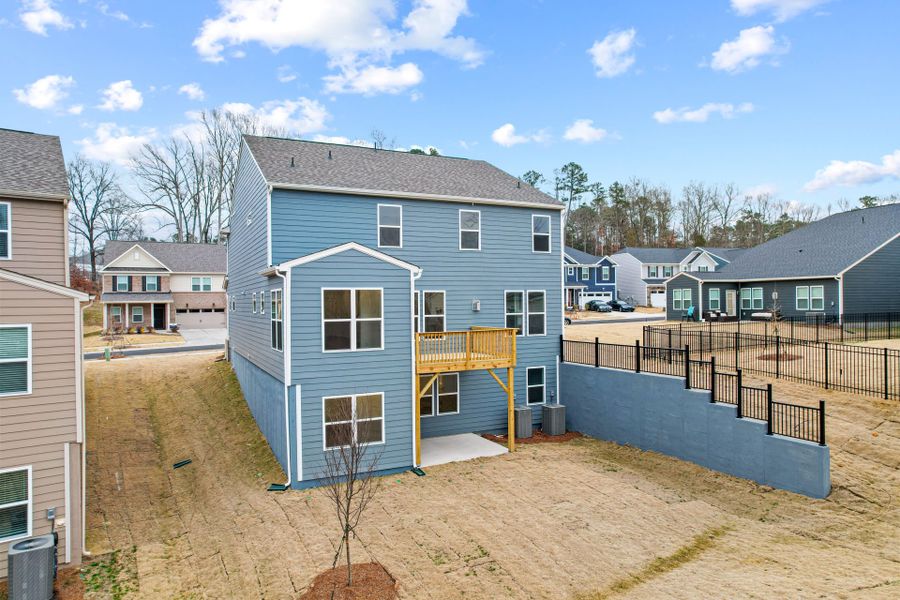 Exterior details and patio area of a home in Bryton, Huntersville (Image 31).