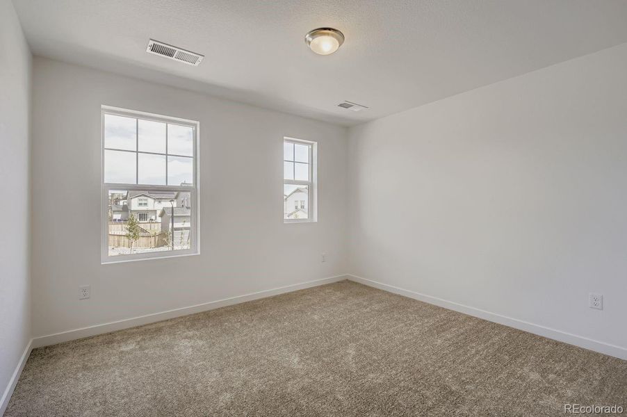 Spacious, unfurnished interior of a new home in Ledge Rock: The Monarch Collection, Johnstown (Image 12).