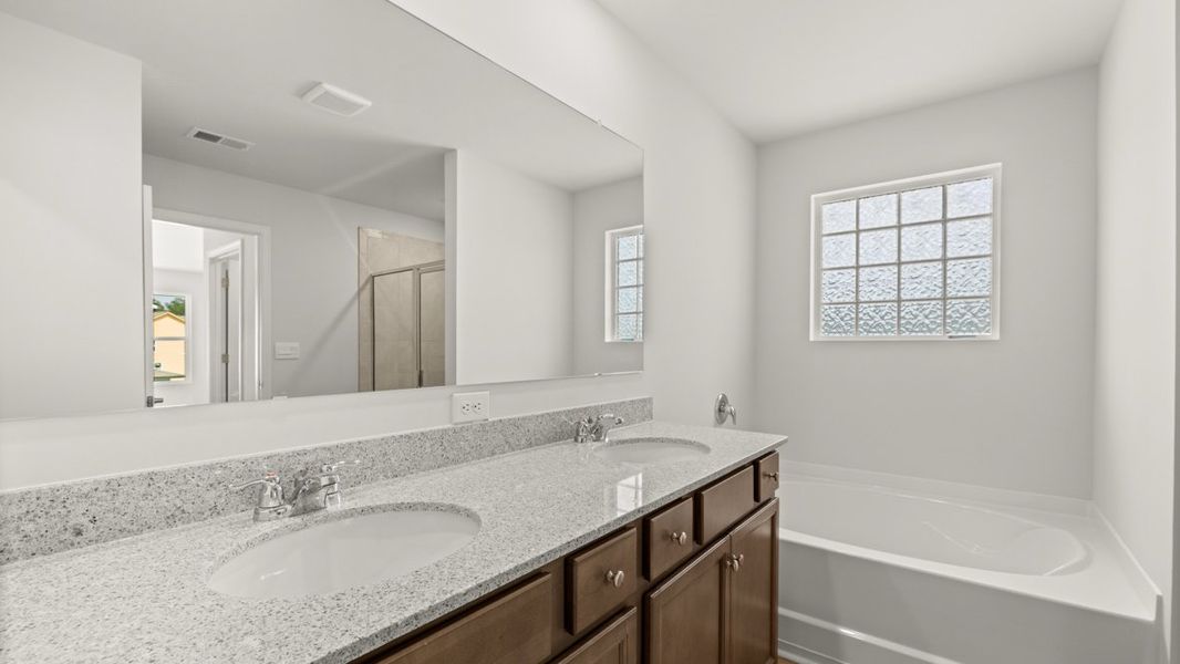 Representative furnished interior of a home built from the Green by D.R. Horton in Fairway 17 at Mirror Lake, Villa Rica (Image 14).