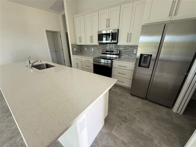 Furnished interior view inside a new home in , Cape Coral (Image 4).