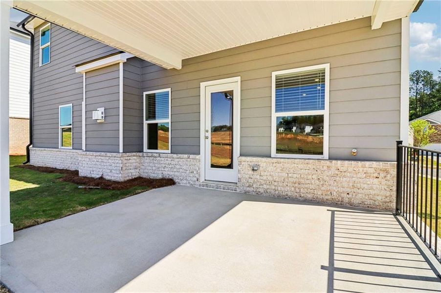 Exterior details and patio area of a home in Harmony Manor, Fairburn (Image 4). Exterior details and patio area of a home in Harmony Manor, Fairburn (Image 4).