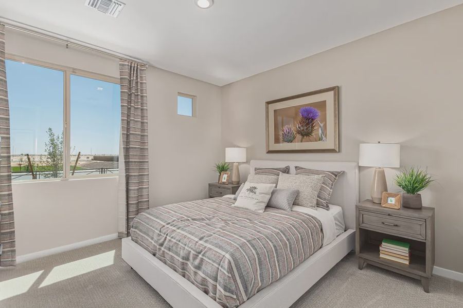 Representative furnished interior of a home built from the 2257 by Elliott Homes in Acacia at Santana, Yuma (Image 27).