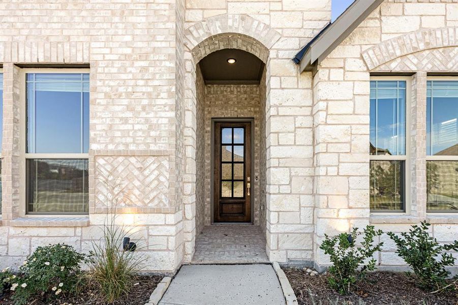 Exterior details and patio area of a home in The Enclave at Parks of Aledo, Aledo (Image 19). Exterior details and patio area of a home in The Enclave at Parks of Aledo, Aledo (Image 19).