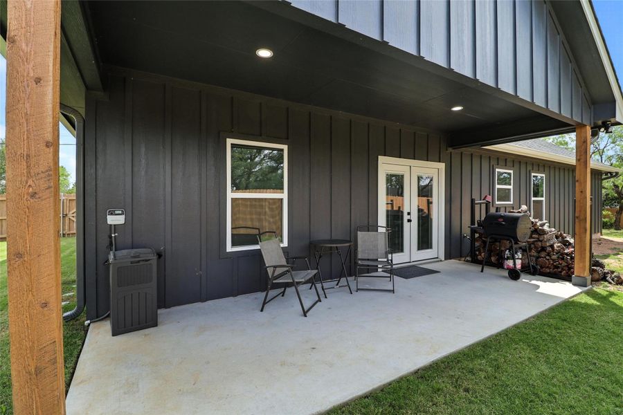 View of patio featuring french doors and grilling area