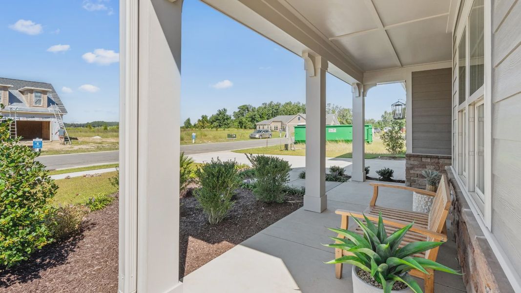 Exterior details and patio area of a home in Courtyards by Carrell, Ocean Isle Beach (Image 26). Exterior details and patio area of a home in Courtyards by Carrell, Ocean Isle Beach (Image 26).