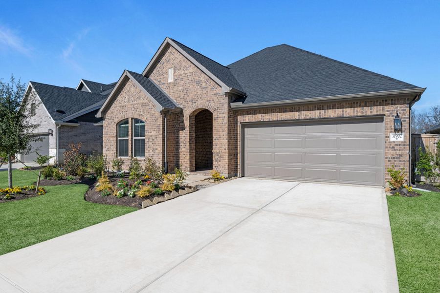 Front exterior of a new home in Dellrose, Hockley, TX, highlighting curb appeal (Image 25).
