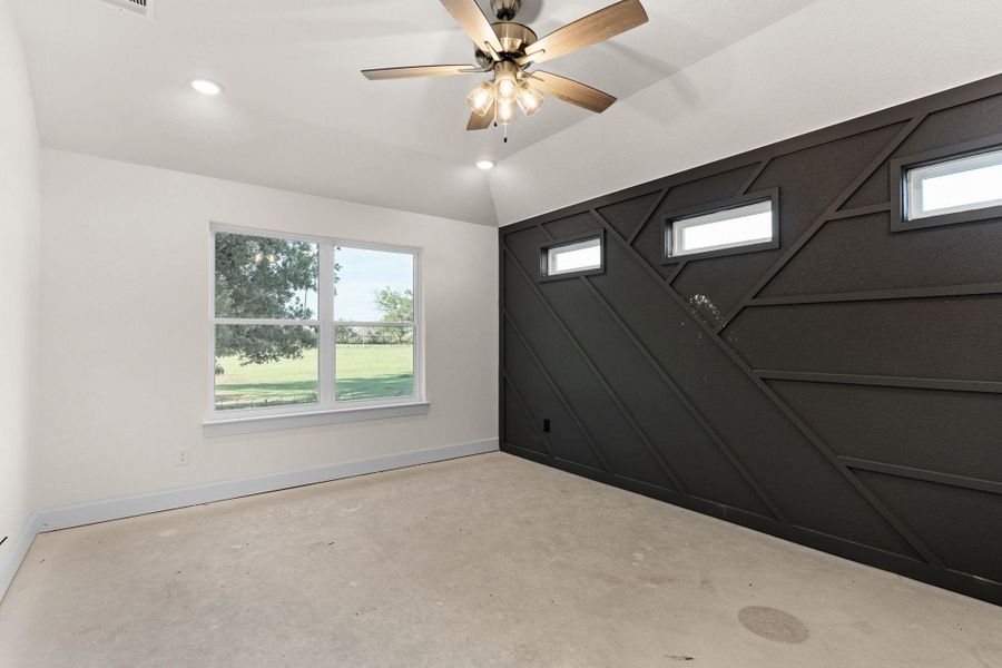 Empty room featuring concrete flooring, recessed lighting, and ceiling fan Empty room featuring concrete flooring, recessed lighting, and ceiling fan