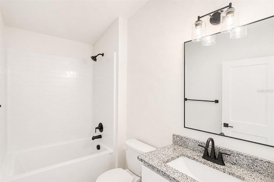 Furnished interior view inside a new home in Harmony Central, St. Cloud (Image 6).