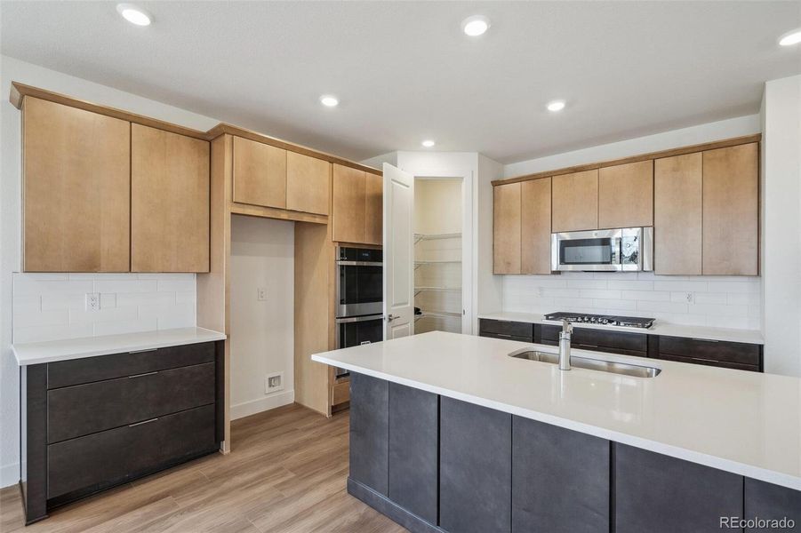 Furnished interior view inside a new home in Windsong, Thornton (Image 3).