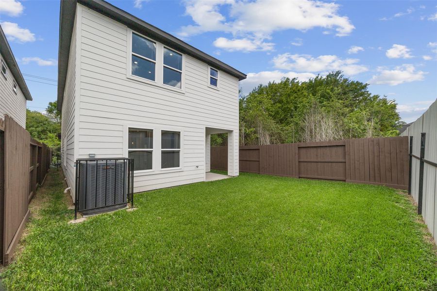 Exterior details and patio area of a home in , Houston (Image 4).