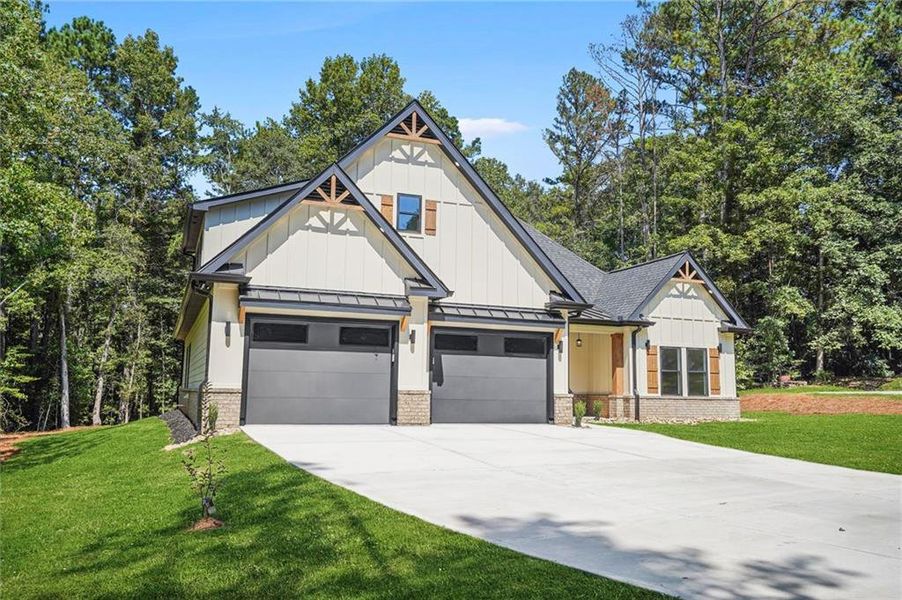 Front exterior of a new home in , Snellville, GA, highlighting curb appeal (Image 26).
