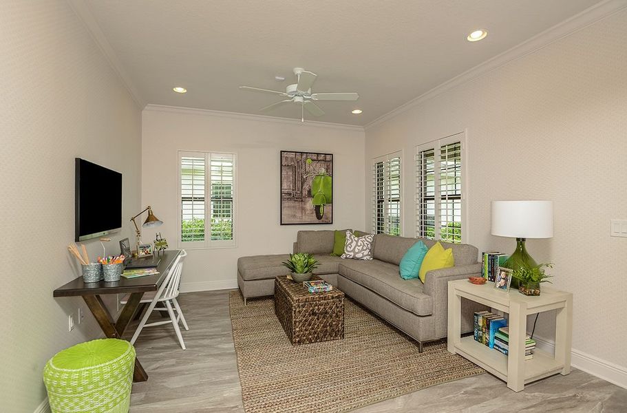 Representative furnished interior of a home built from the Meadow Brook by Neal Communities in Verandah, Fort Myers (Image 10).