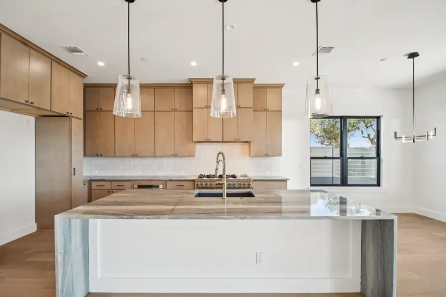 Furnished interior view inside a new home in Milky Way at River Place, Austin (Image 8).