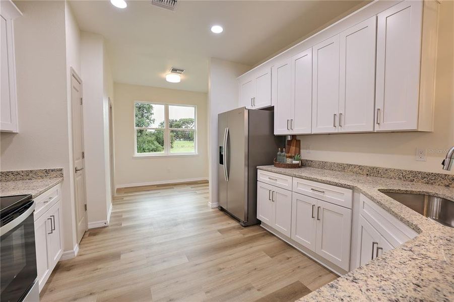 Furnished interior view inside a new home in , Sebring (Image 11).